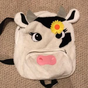 Claire’s cute cow laptop backpack